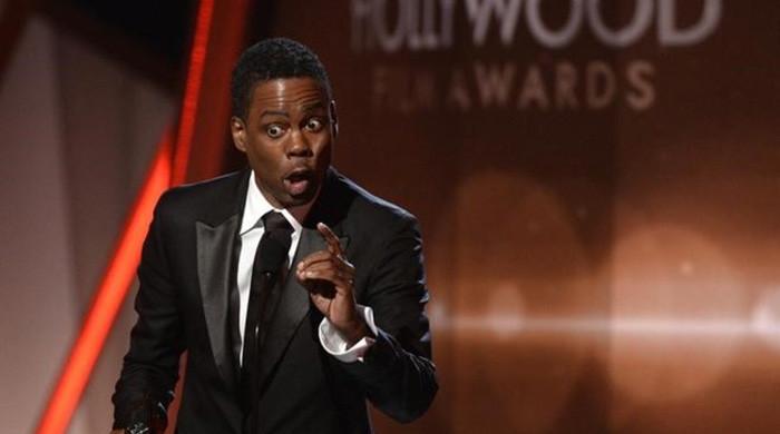 Chris Rock raves about producer who is accused of bullying 