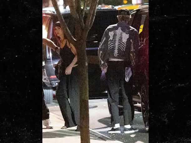 Dakota Johnson was spotted with MGK in New York