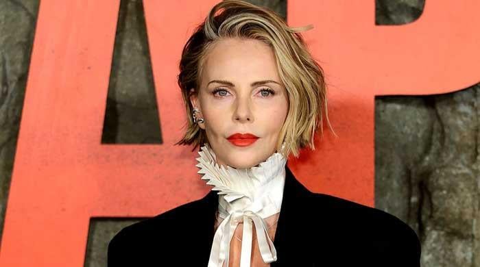 Charlize Theron explains how motherhood shapes her activism 