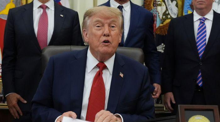 Judge blocks Trump’s White House media ban, restores access 