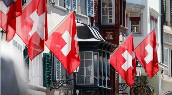 Swiss voters reject strict neutrality initiative to preserve NATO cooperation and sanctions