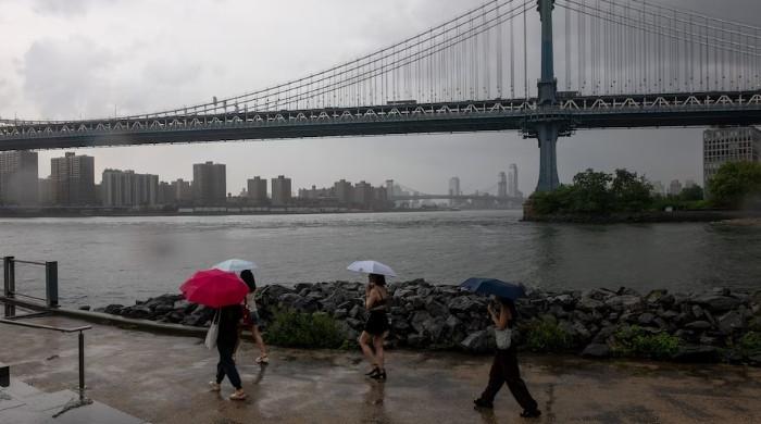 Nor’easter kills one and leaves nearly 140,000 without power on US East Coast