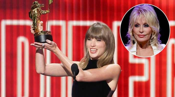 Taylor Swift pays emotional homage to Dolly Parton while accepting top prize at MTV VMAs