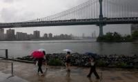 Nor’easter kills one and leaves nearly 140,000 without power on US East Coast
