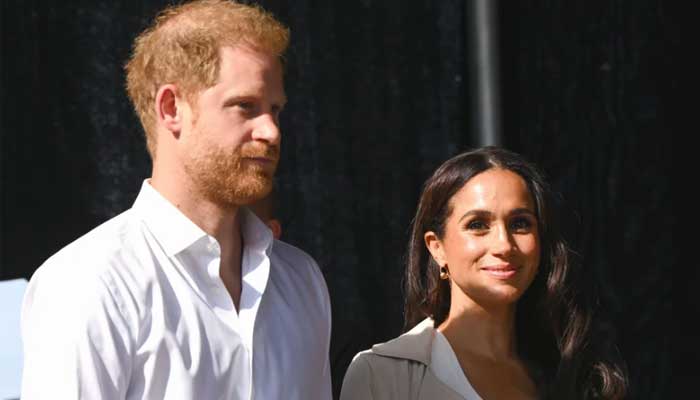 Harry and Meghan issue statement after men caught watching Archie and Lilibets school