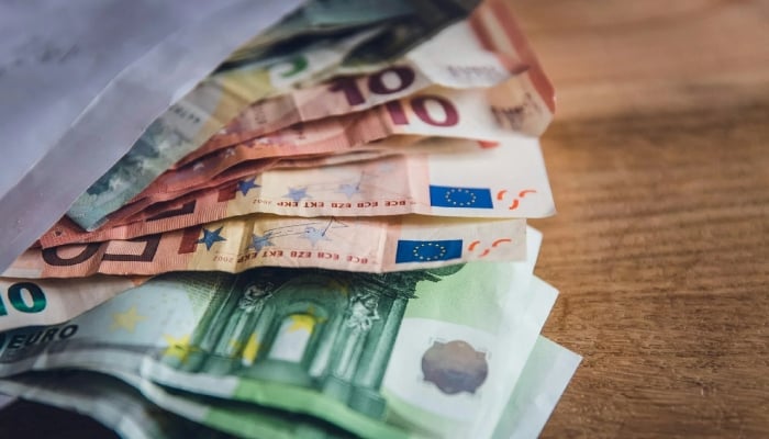 Euro plunges to 17-month low as France debt and Spain election fuel uncertainty