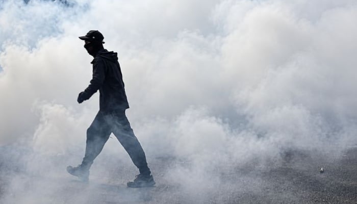 France school protests: 15-year-old loses hand after picking up police grenade