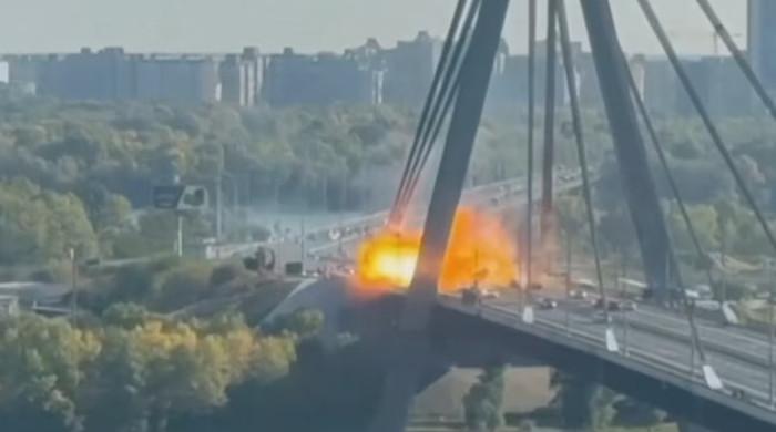 Russia attacks key Kyiv bridge as German chancellor arrives in Ukraine