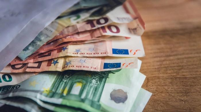 Euro plunges to 17-month low as France debt and Spain election fuel uncertainty