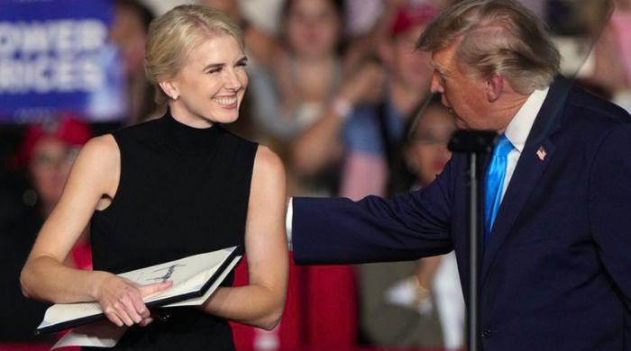 Trump and close aide Natalie Harp take center stage at Nebraska rally 