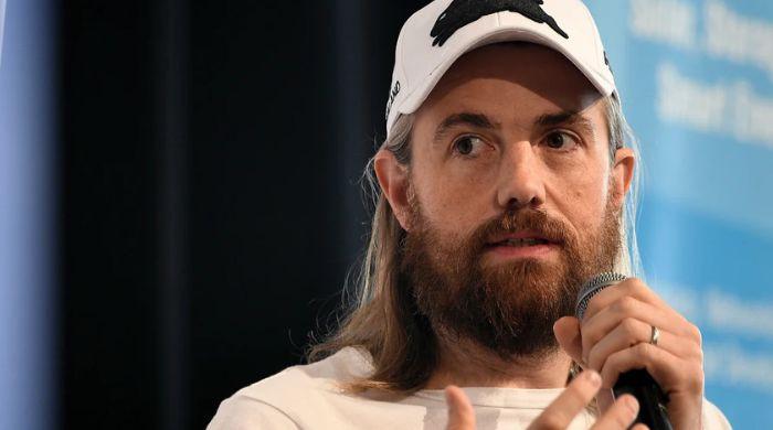 Atlassian's CEO says AI can't be paused: Here's his reason