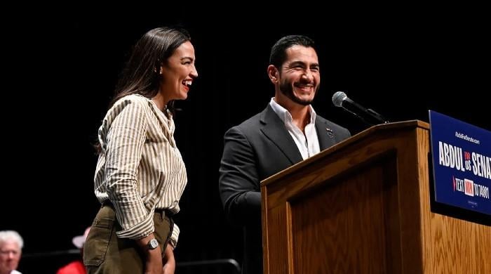 AOC calls for political unity while campaigning for Abdul El-Sayed in Michigan