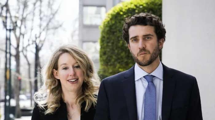 Elizabeth Holmes' partner defends participation in 'You Can See Everything' 