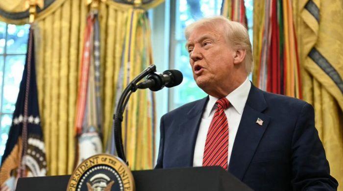 Trump reacts to violent unrest in France, blames immigration