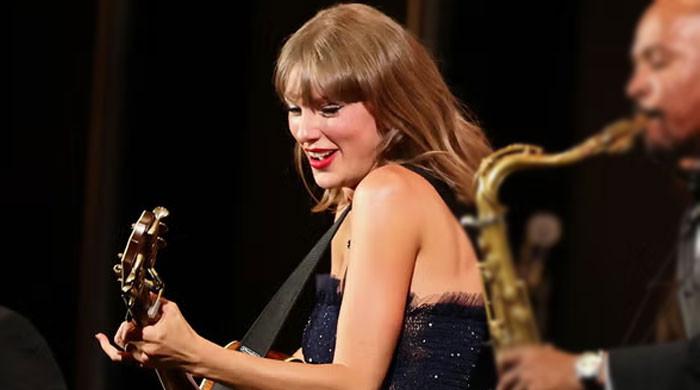 Taylor Swift calls out fan for filming her at Chiefs game