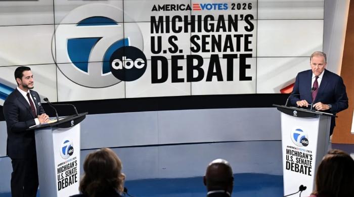 Abdul El-Sayed and Mike Rogers clash over Trump, patriotism in Michigan Senate debate